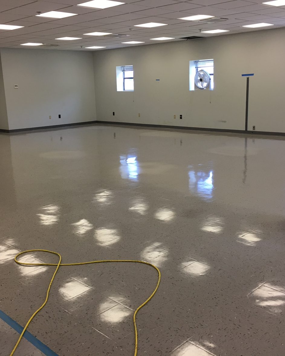 Large room with a glossy finished floor